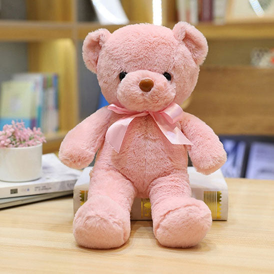 Peluche en ours rose