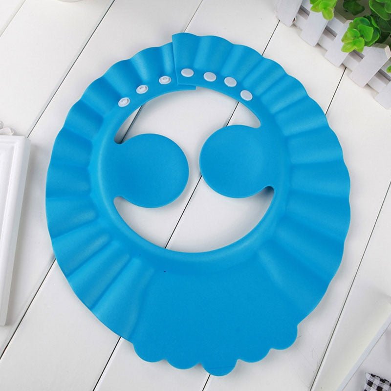 Visière chapeau pour douche bébé I ShampooCap™ - Surface Bébé